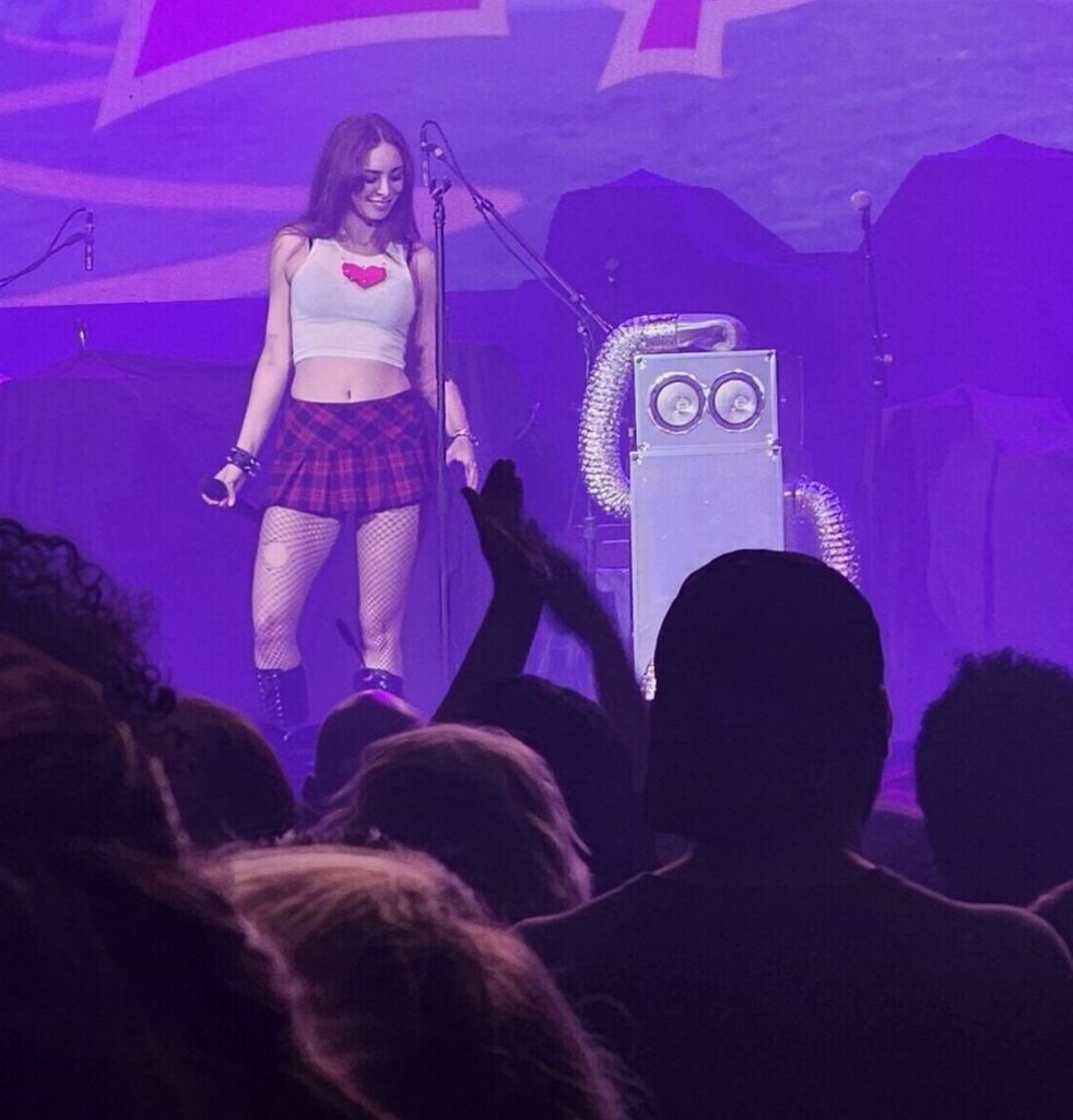 LoLo poses with her robot